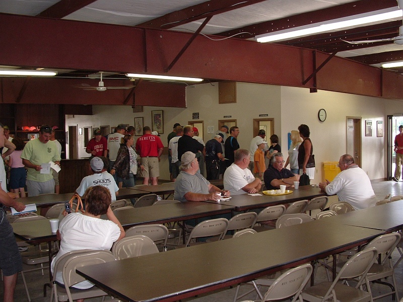 dscf0011tnd.jpg - Inside the clubhouse, cashiering.
