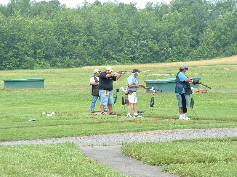 dscf0042t.jpg - Dave Shaeffer, All American, on 2 and Stephen "Doc" Ollock on 3 during the singles championship. Shaeffer ran the full 200, Doc ran the front side. They're shooting on bank 7A.