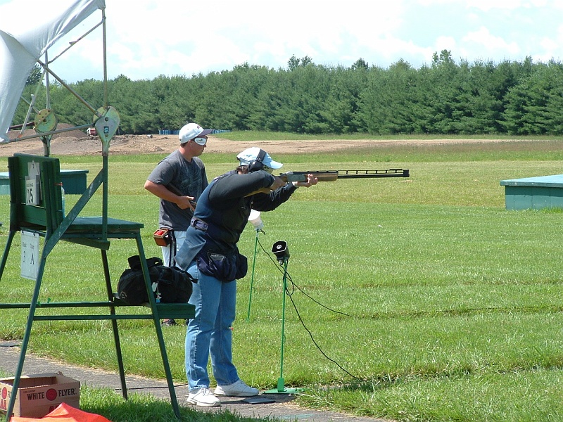 dscf0076i.jpg - Debbie Ohye Neilson (women's all american captain) shooting in today's handicap event. You can see Dylan Darhower, Pennsylvania Trapshooter of the Year behind her. I think Debbie broke a 92 in the event and Dylan had an 89. 