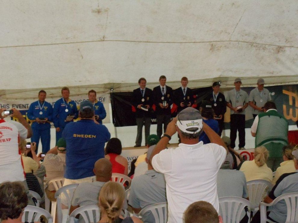 DSC00318.jpg - The closing down of the event with the awards being given out. Here we see the English juniors at the top of the podium followed by second place juniors from Sweden and in third, the New Zealand juniors. A job well done by the junior teams!!